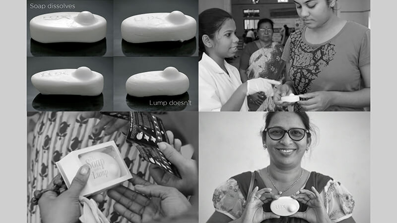 Bánh xà phòng Lux trong tay nữ giới Ấn Độ.